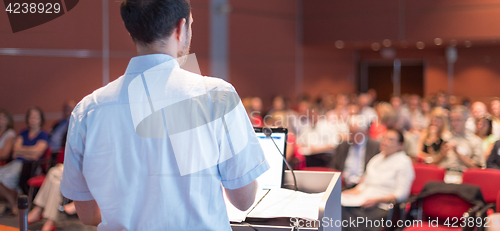 Image of Public speaker giving talk at scientific conference.