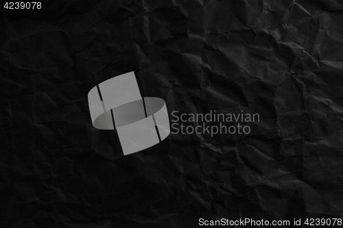 Image of damaged black paper texture