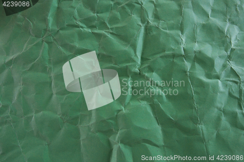 Image of damaged green paper texture