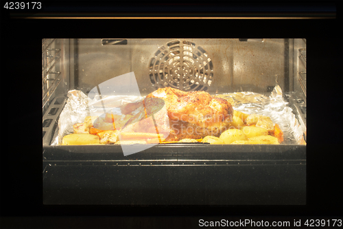 Image of Roast chicken in the oven