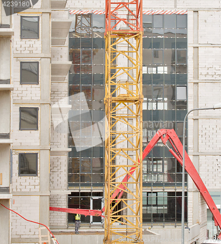 Image of construction site, building and crane