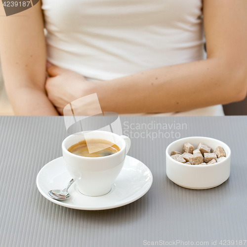 Image of cup of coffee on a table at the cafe