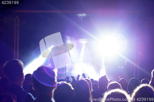 Image of crowd in concert near stage