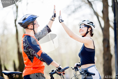 Image of Man, woman on bike ride