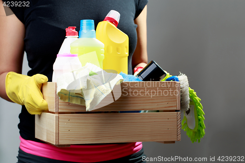 Image of Girl in gloves with box