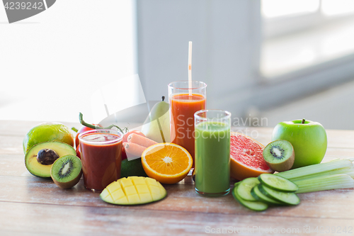 Image of glasses with different fruit or vegetable juices