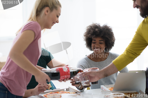 Image of multiethnic group of young people have a lunch break