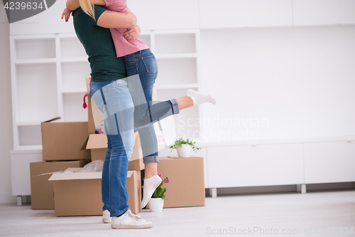 Image of happy Young couple moving in new house