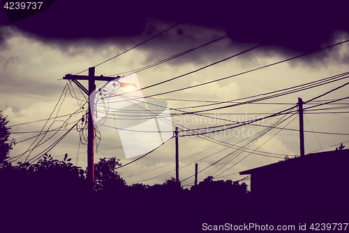 Image of Street light at night with a stormy sky background