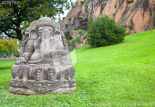 Image of Ganesha statue in a beautiful mountain garden