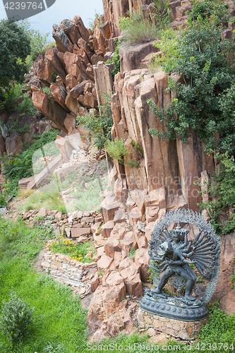 Image of Tantric Deities statue in Ritual Embrace located in a mountain g