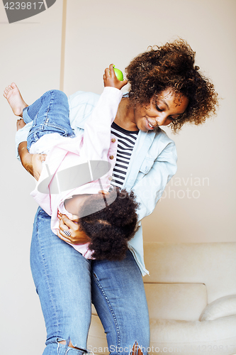 Image of adorable sweet young afro-american mother with cute little daugh