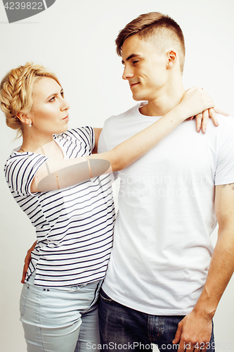 Image of young pretty teenage couple, hipster guy with his girlfriend happy smiling and hugging isolated on white background, lifestyle people concept