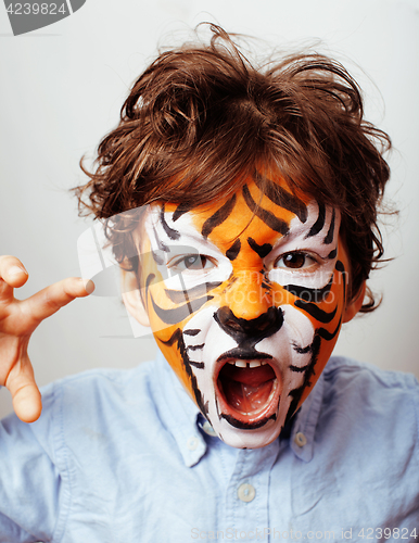 Image of little cute boy with faceart on birthday party close up, little 