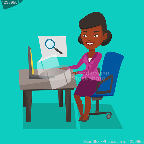 Image of Business woman working on her laptop.