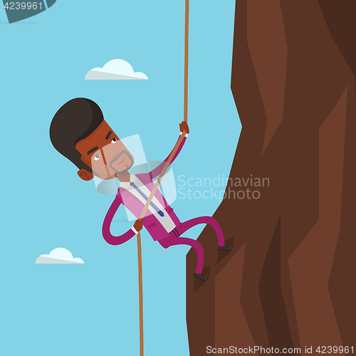 Image of Businessman climbing on the mountain.