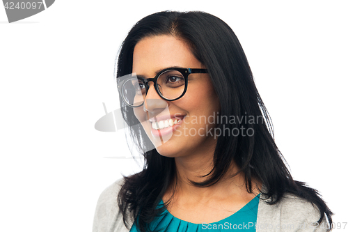 Image of happy smiling young indian woman in glasses