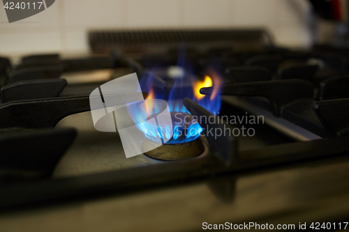 Image of burning gas stove flame