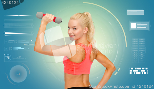 Image of happy young sporty woman exercising with dumbbells