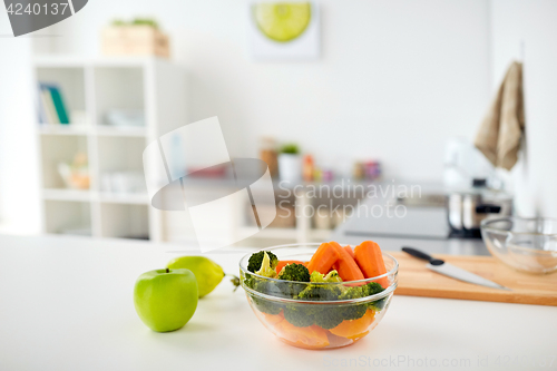 Image of bowl with food on kitchen table at home