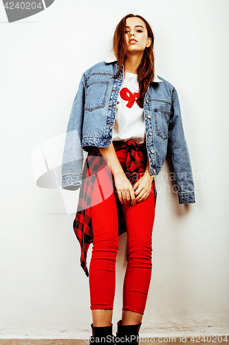 Image of young pretty teenage hipster girl posing emotional happy smiling on white background, lifestyle people concept 