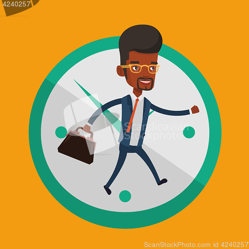 Image of Businessman running on clock background.