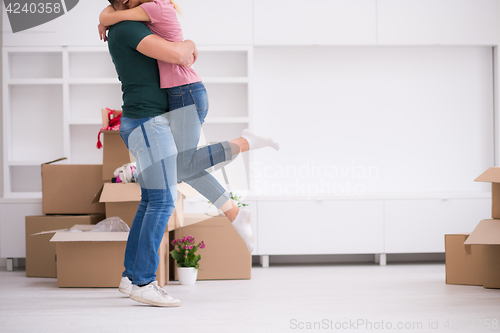 Image of happy Young couple moving in new house