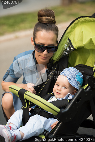 Image of mother and baby in the park