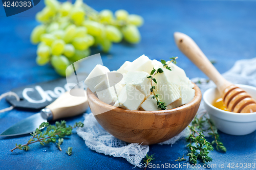 Image of cheese with grape