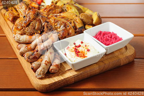 Image of Big grilled meat and vegetables board
