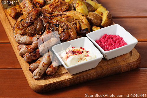 Image of Big grilled meat and vegetables board