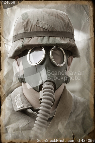 Image of German soldier in gas mask. WW2 reenacting