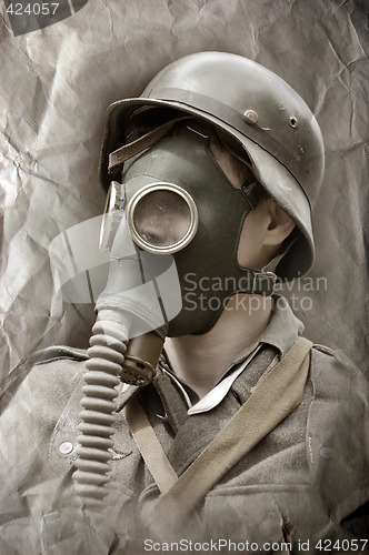 Image of German soldier in gas mask. WW2 reenacting