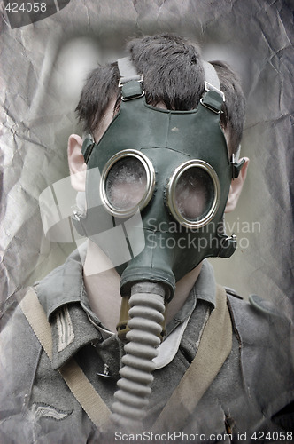 Image of German soldier in gas mask. WW2 reenacting