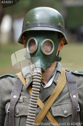 Image of German soldier in gas mask. WW2 reenacting