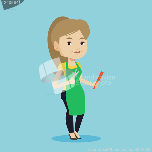 Image of Hairstylist holding comb and scissors in hands.