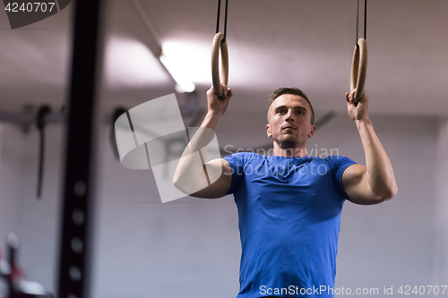 Image of man doing dipping exercise