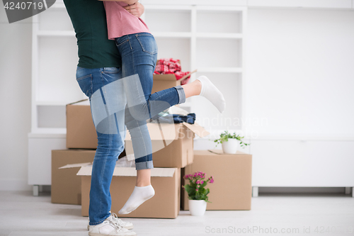 Image of happy Young couple moving in new house