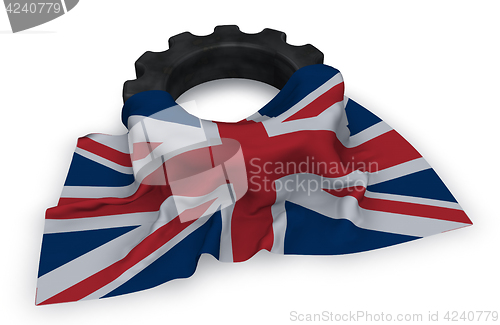 Image of gear wheel and flag of the united Kingdom of Great Britain and Northern Ireland - 3d rendering