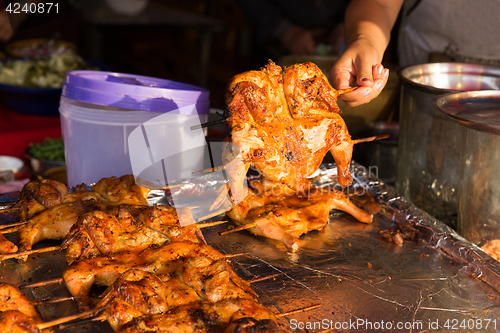 Image of quail grill on street market