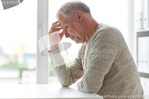 Image of close up of senior man thinking