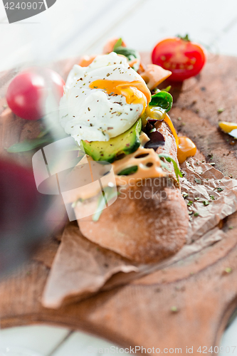 Image of The baguette and cheese on wooden background