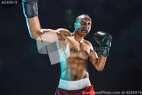 Image of Afro american male boxer.