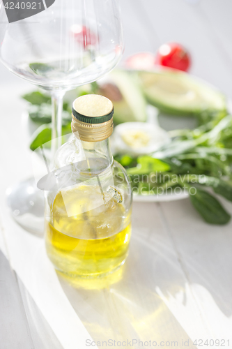 Image of The baguette and cheese on wooden background