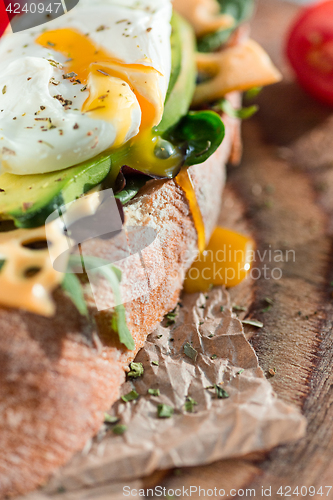 Image of The baguette and cheese on wooden background