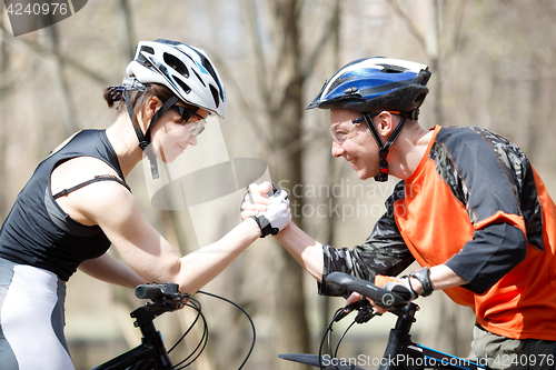Image of Photo of athletes with bicycles