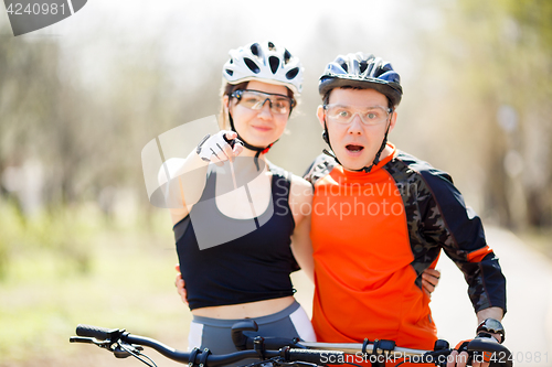 Image of Young cyclists, focused on hand