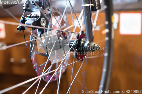Image of Bicycle wheel on blurred background