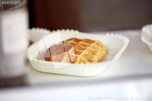 Image of close up of waffle on paper plate