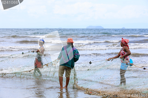 Image of Native Malagasy fishermen fishing on sea, Madagascar